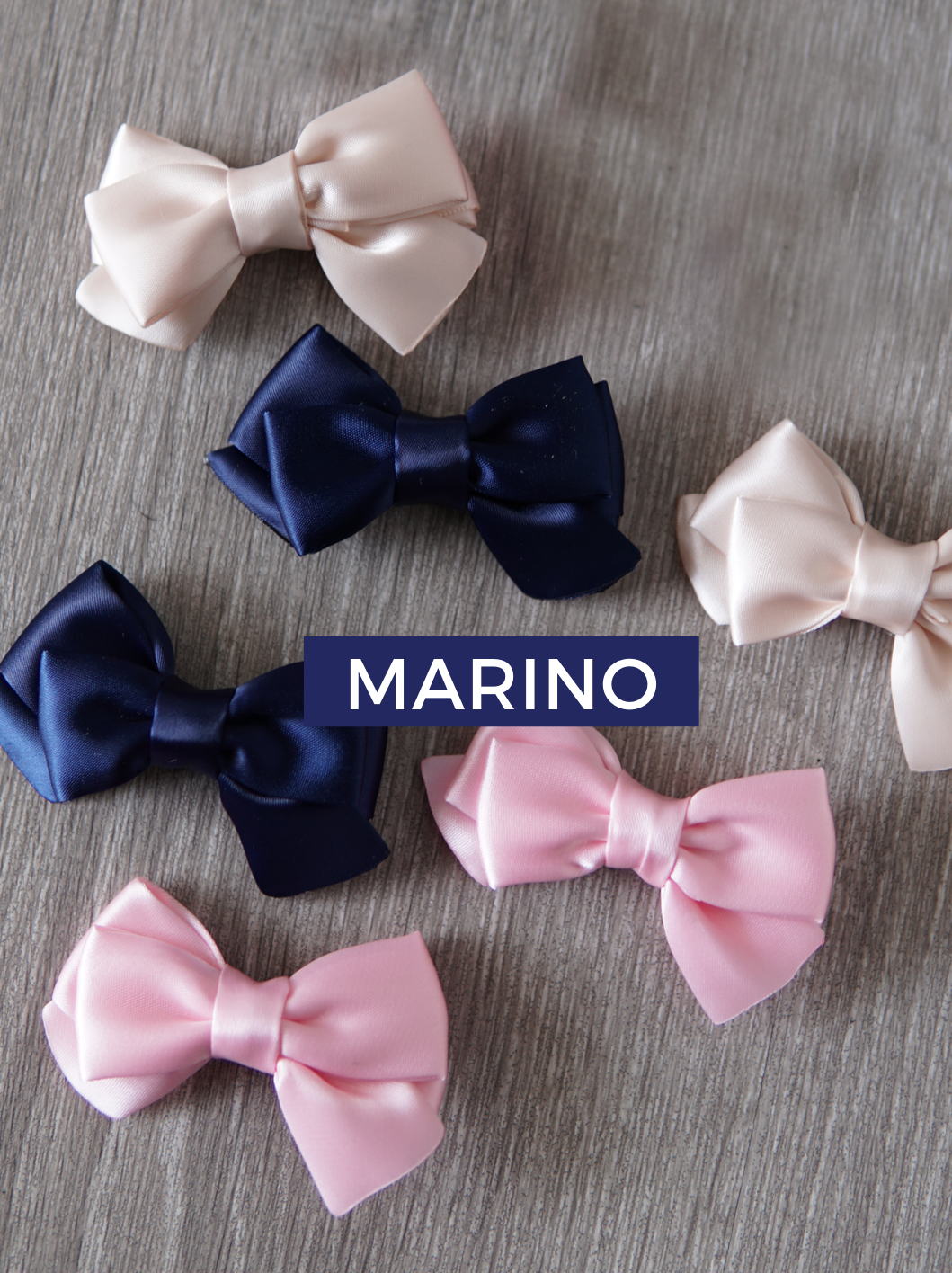 par de moños con broche