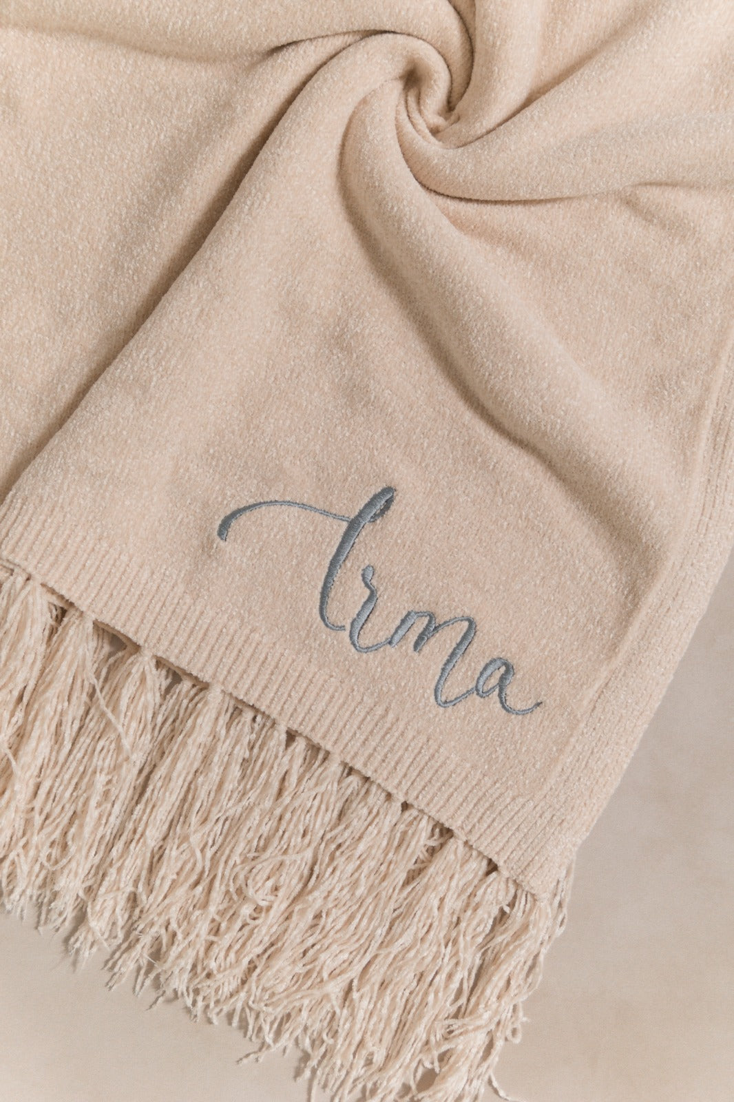 cobija lisa con flecos